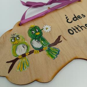 Madárpár -kopogtató ajtóra