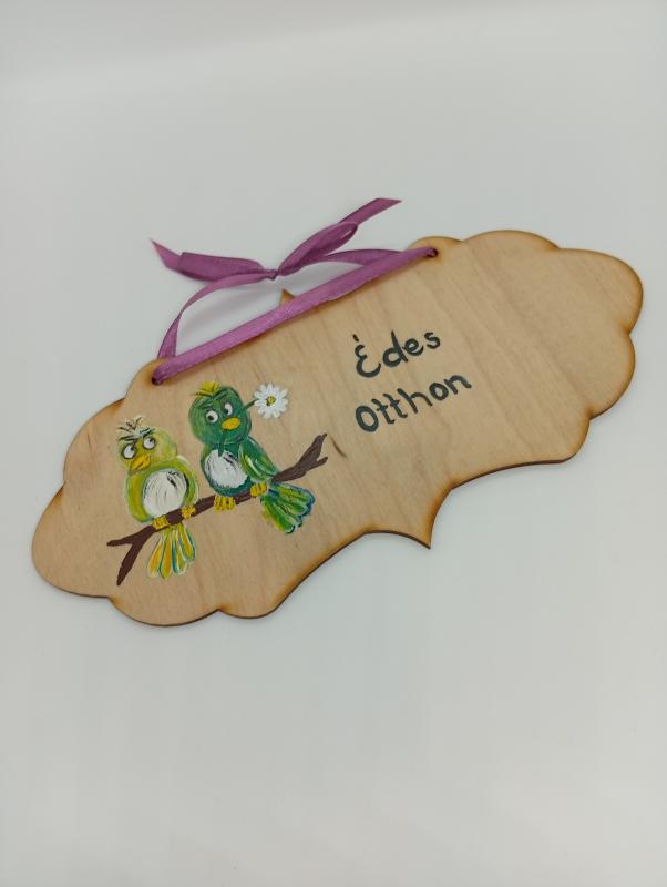 Madárpár -kopogtató ajtóra