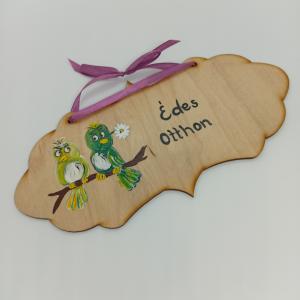 Madárpár -kopogtató ajtóra