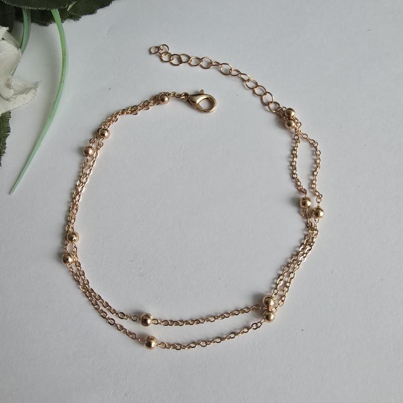 Aranyszínű 2 soros karlánc, karkötő apró gyöngyökkel