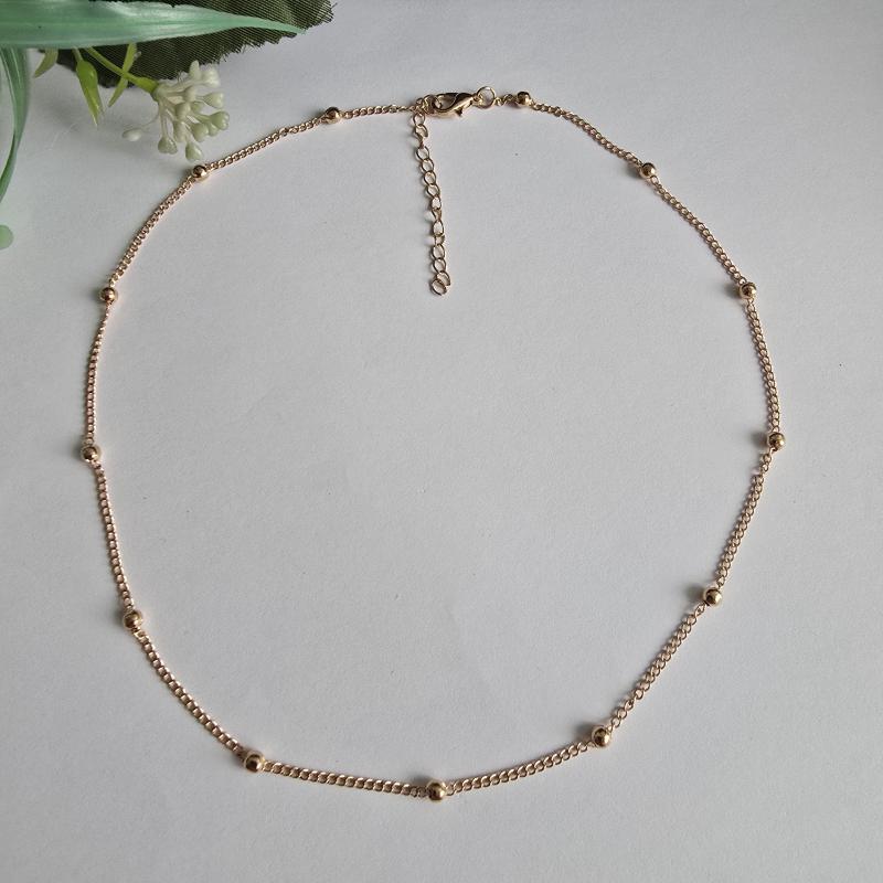 Aranyszínű minimalista nyaklánc apró gyöngyökkel