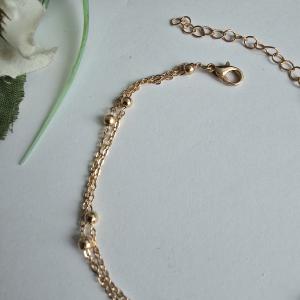 Aranyszínű 2 soros karlánc, karkötő apró gyöngyökkel