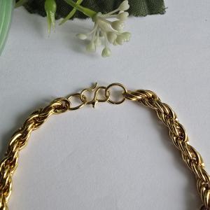 Aranyszínű, vastagabb sodort karkötő, karlánc