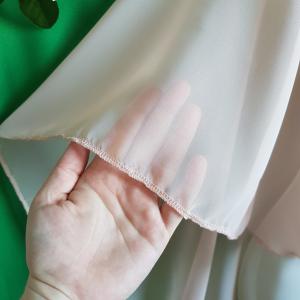 Barack színű muszlin pelerin, elöl rövid, hátul hosszú alkalmi válltakaró