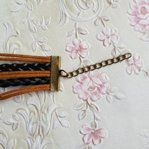 Barna-fekete színű műbőr karkötő fém díszekkel - végtelen jel, szárnyas koponya, DREAM