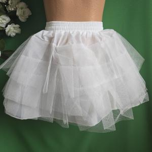 Fehér színű fodros gyerek alsószoknya tépőzáras, megkötős derékkal