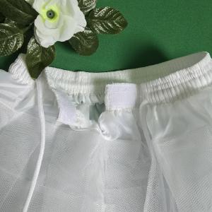 Fehér színű fodros gyerek alsószoknya tépőzáras, megkötős derékkal