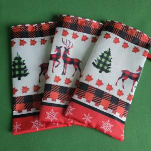 Karácsonyi fenyőfa, rénszarvas, mikulásvirág mintás mikulás zsák, textil ajándéktasak