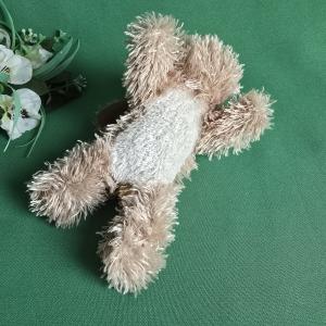 Mikulás sapkás plüss kutya