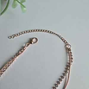 Rosegold színű, strasszköves, 2 soros karkötő, karlánc