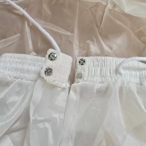 Törtfehér színű 3 karikás menyasszonyi alsószoknya, abroncs patentos, megkötős derékkal