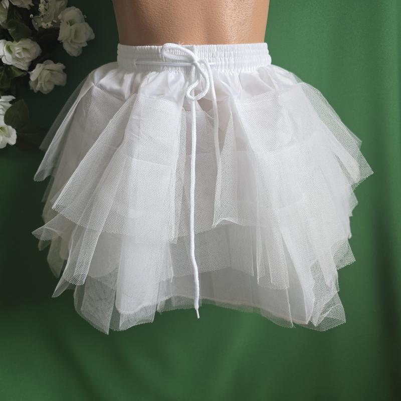 Fehér színű fodros gyerek alsószoknya tépőzáras, megkötős derékkal