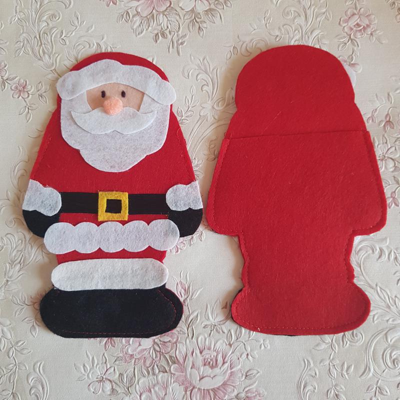 Kézzel készített mikulás alakú karácsonyi evőeszköztartó