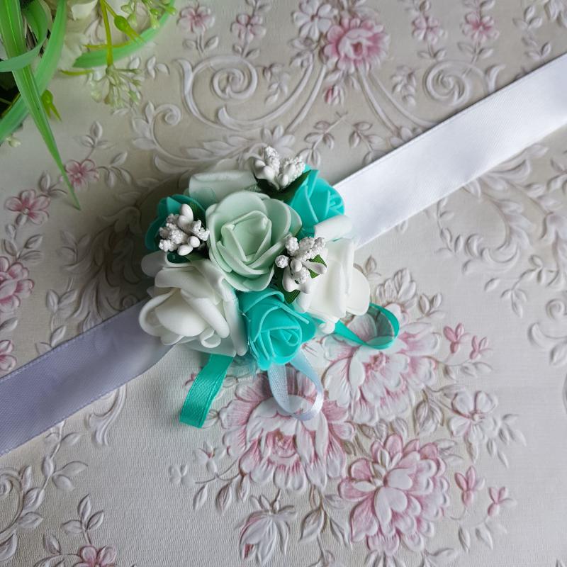 Mentazöld-fehér színű rózsás, gyöngyös csuklódísz