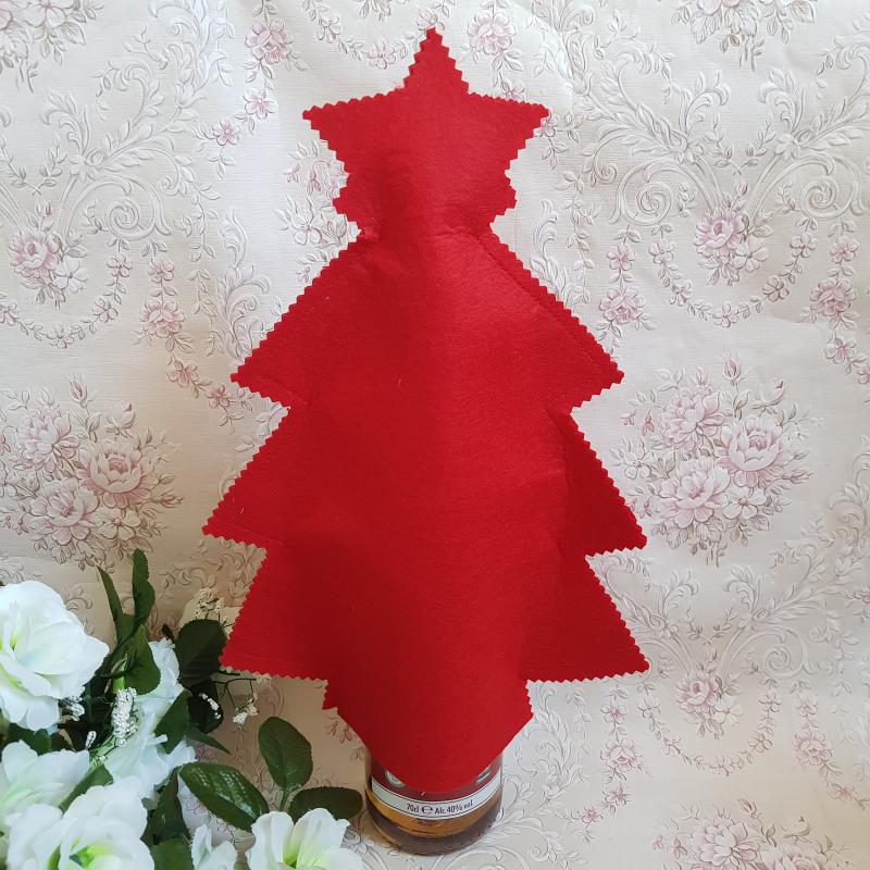 Piros színű karácsonyfa alakú ajándék csomagolás borosüvegre