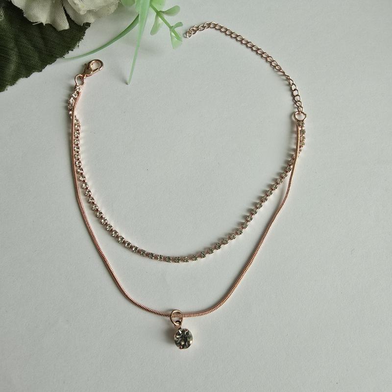 Rosegold színű, strasszköves, 2 soros karkötő, karlánc