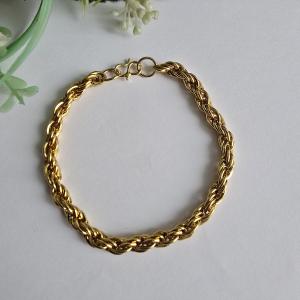 Aranyszínű, vastagabb sodort karkötő, karlánc