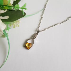 Strasszköves, citromsárga szív díszes szerelmi bájitalos palack medálos nyaklánc