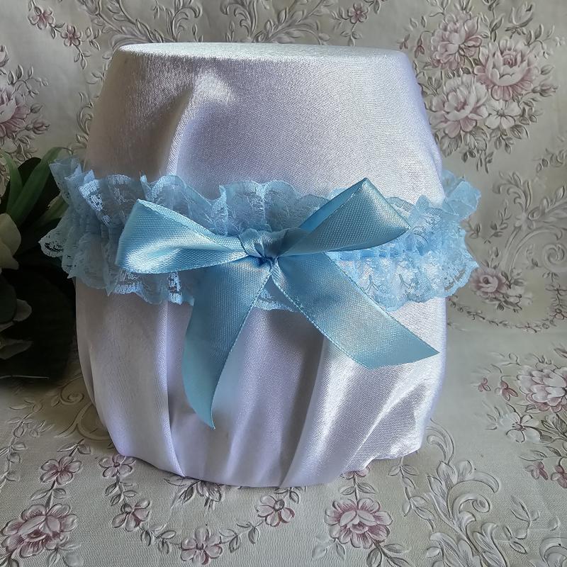 Világoskék csipkés, világoskék masnis menyasszonyi harisnyakötő, combcsipke