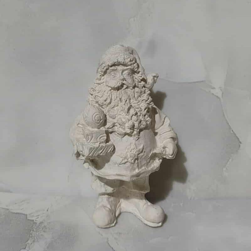 Ajándékot tartó Mikulás