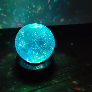 Színváltó glitteres gömb