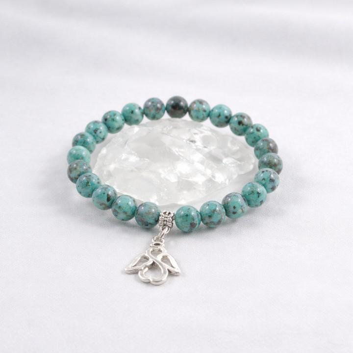 Afrikai türkiz karkötő angyallal