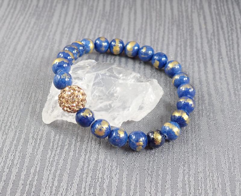 Arany-kék jáde karkötő shamballával