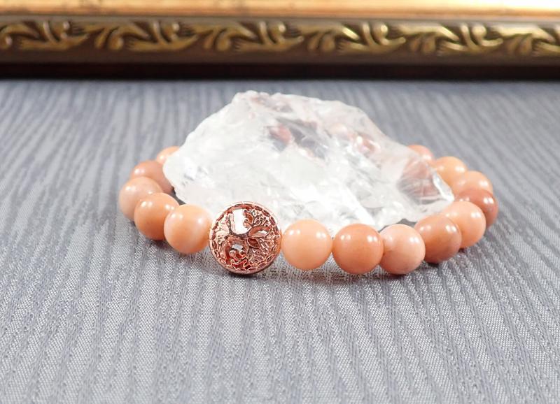 Barackszín aventurin karkötő rosegold színű dísszel