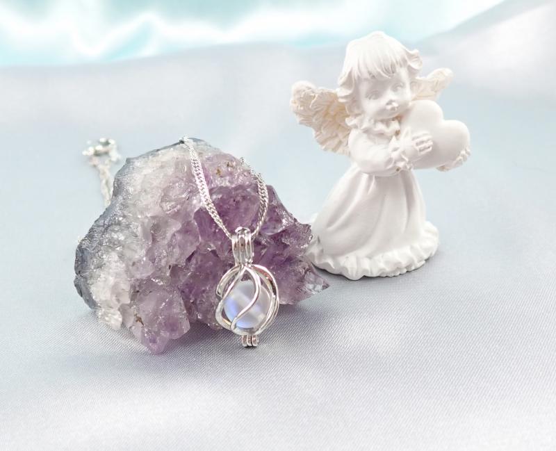 Csavart, nyitható medál aurakvarccal