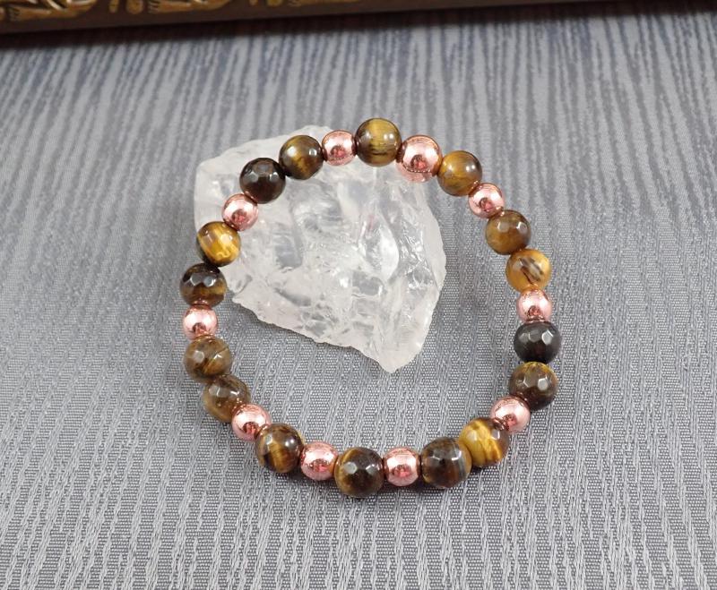 Csiszolt tigrisszem és rosegold hematit karkötő