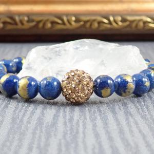 Arany-kék jáde karkötő shamballával