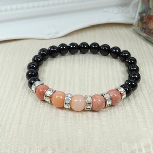 Barackszín aventurin és ónix karkötő