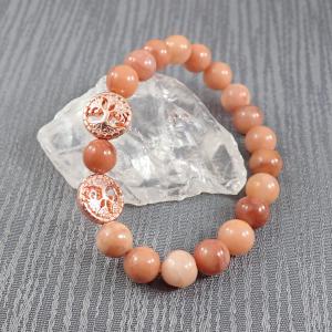 Barackszín aventurin karkötő két rosegold dísszel