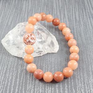 Barackszín aventurin karkötő rosegold színű dísszel