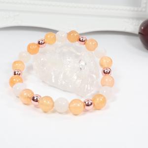 Jáde és rosegold hematit karkötő, barackszín