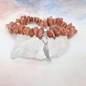 Napkő szemcse karkötő angyalszárnnyal