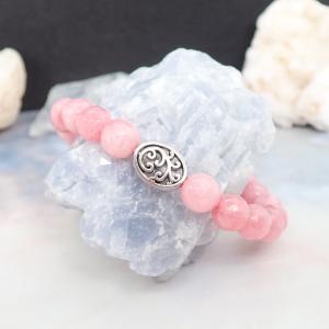 Rózsaszín achát karkötő fém gyönggyel