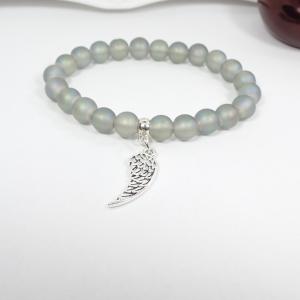 Szürke achát karkötő angyalszárnnyal