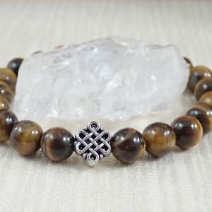 Tigrisszem karkötő végtelen csomó dísszel