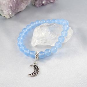 Világoskék jáde karkötő félholddal