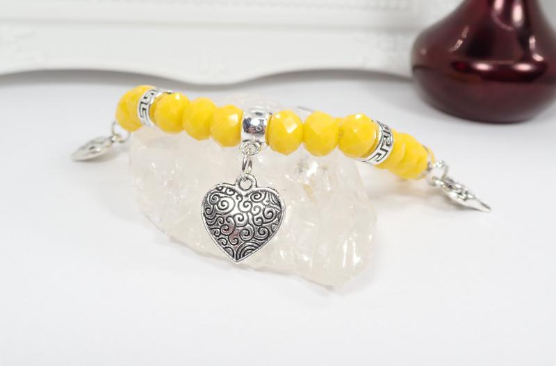 Karkötő négy szívecskével, sárga