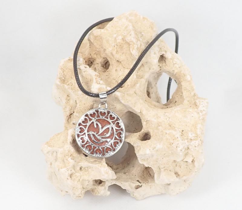 Napköves-madaras medál