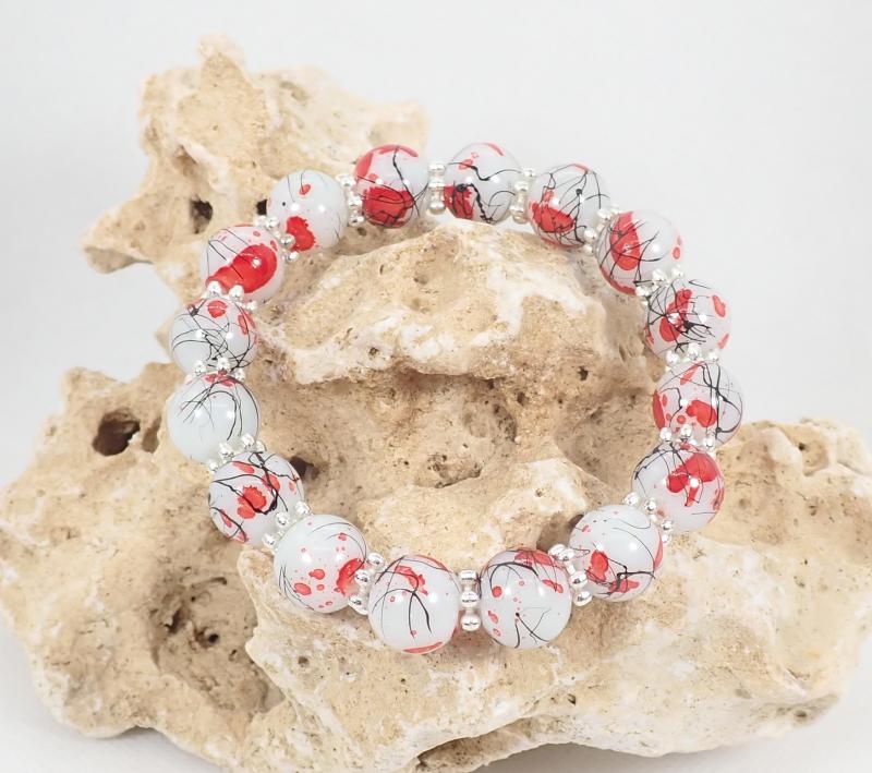 Piros-fehér rajzos karkötő 2