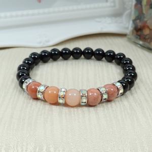 Barackszín aventurin és ónix karkötő