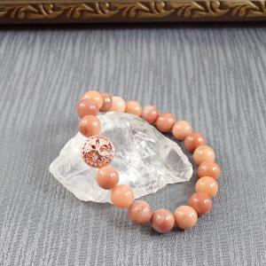 Barackszín aventurin karkötő rosegold színű dísszel (M)