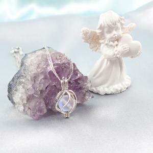 Csavart, nyitható medál aurakvarccal