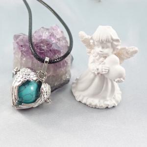 Nyitható, szív alakú medál türkinittel