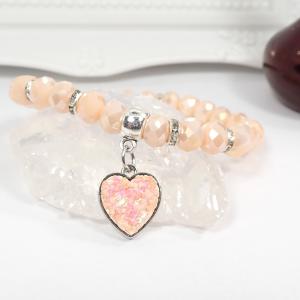 Szívecskés karkötő, barackszín