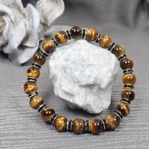 Tigrisszem karkötő fekete díszekkel