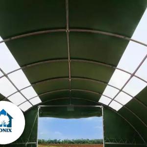 Csarnok, raktársátor, hangársátor mezőgazdasági ívelt sátor  9,15m x 12m x 4,5m ponyva tűzálló PVC tetőabalakkal  sötétzöld